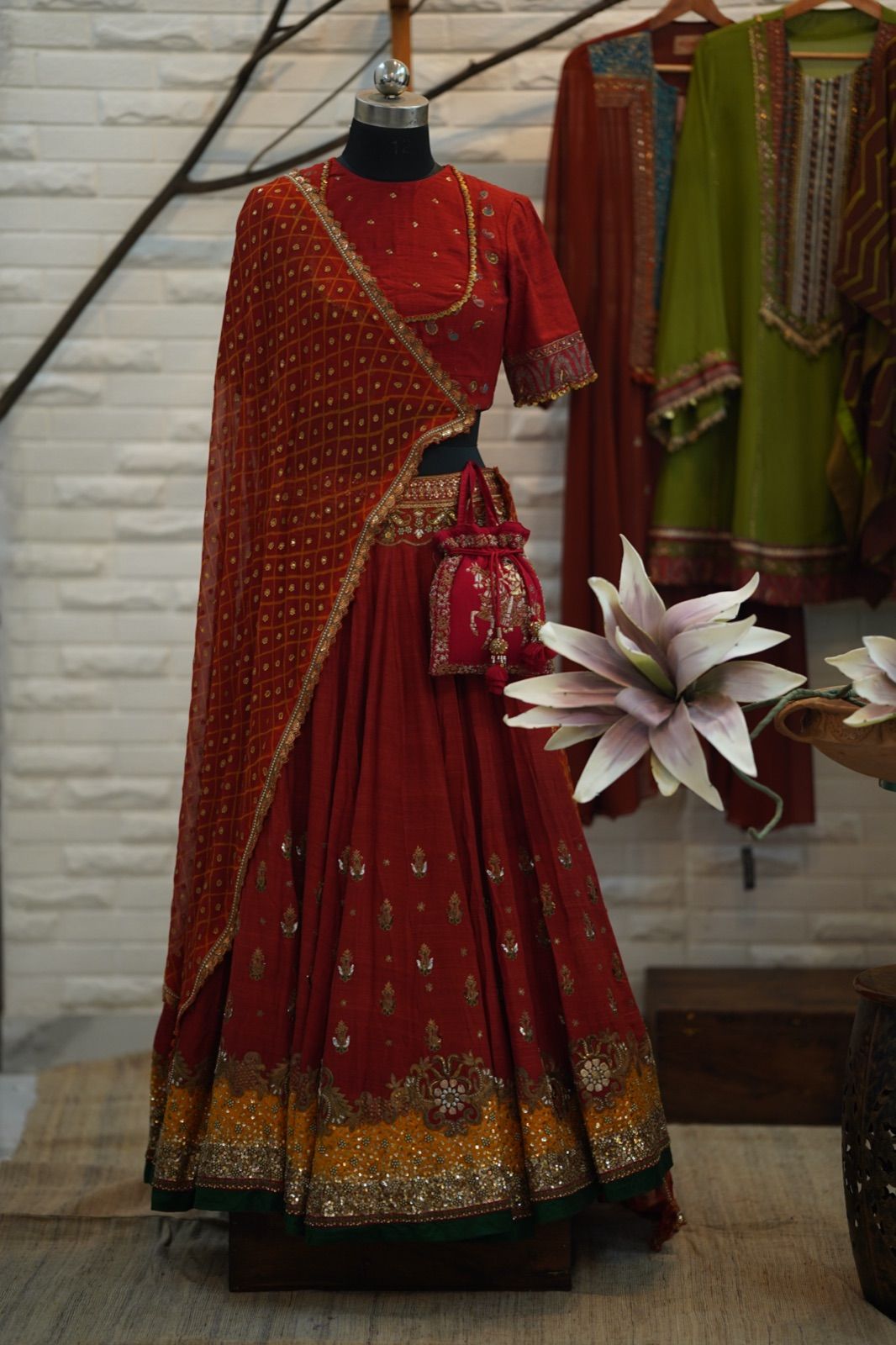 Rust Orange Bandhani Lehenga with Boat-Neck Blouse