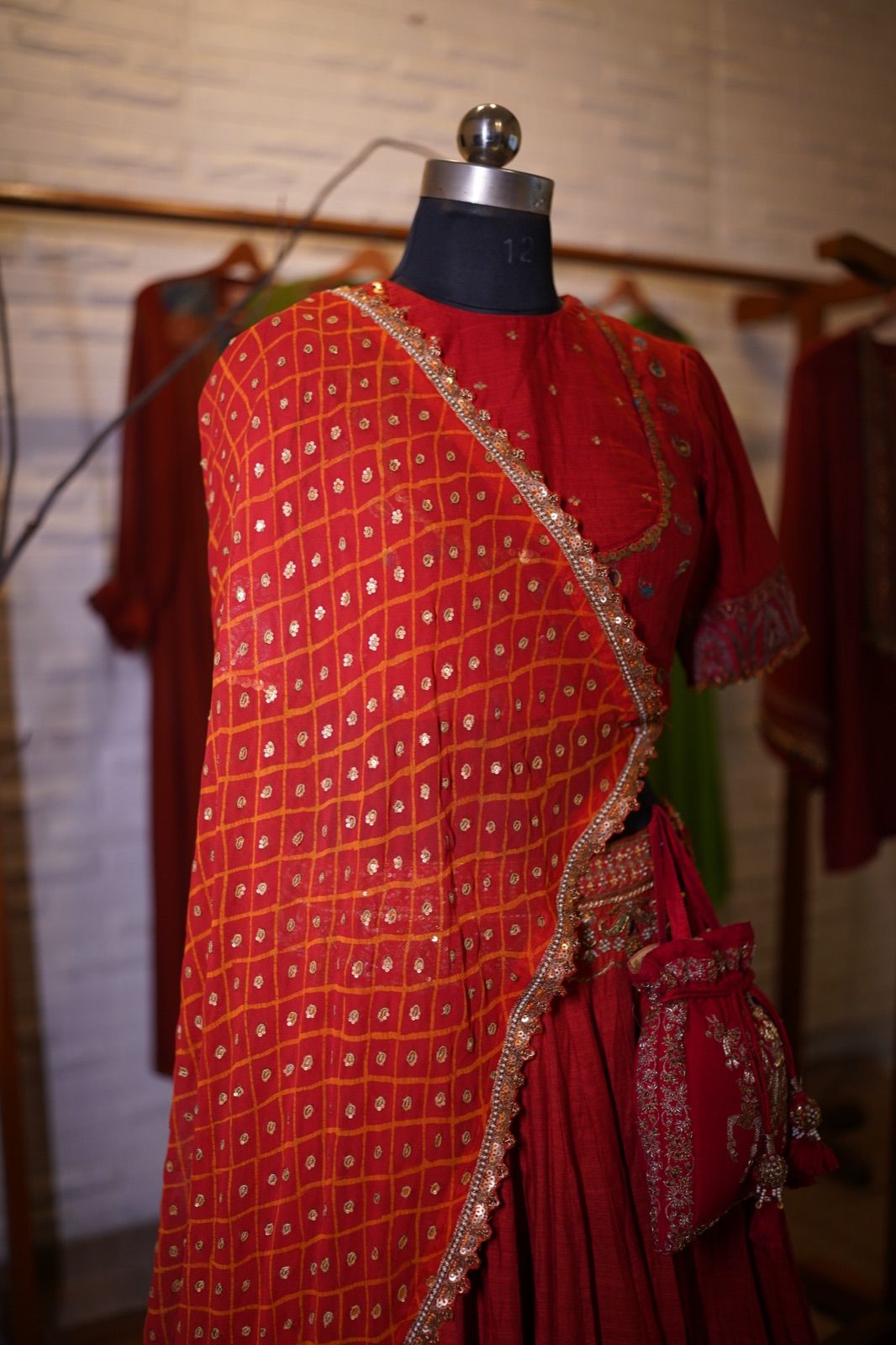 Rust Orange Bandhani Lehenga with Boat-Neck Blouse - view 4