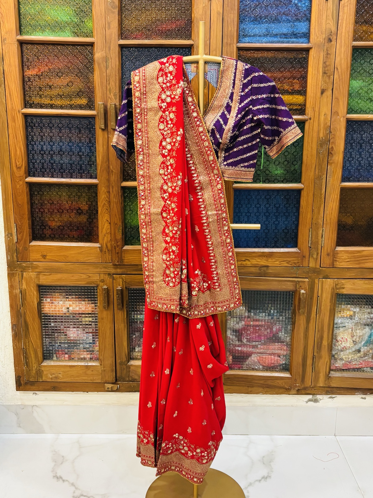 Red Saree with Violet Bandhani Blouse