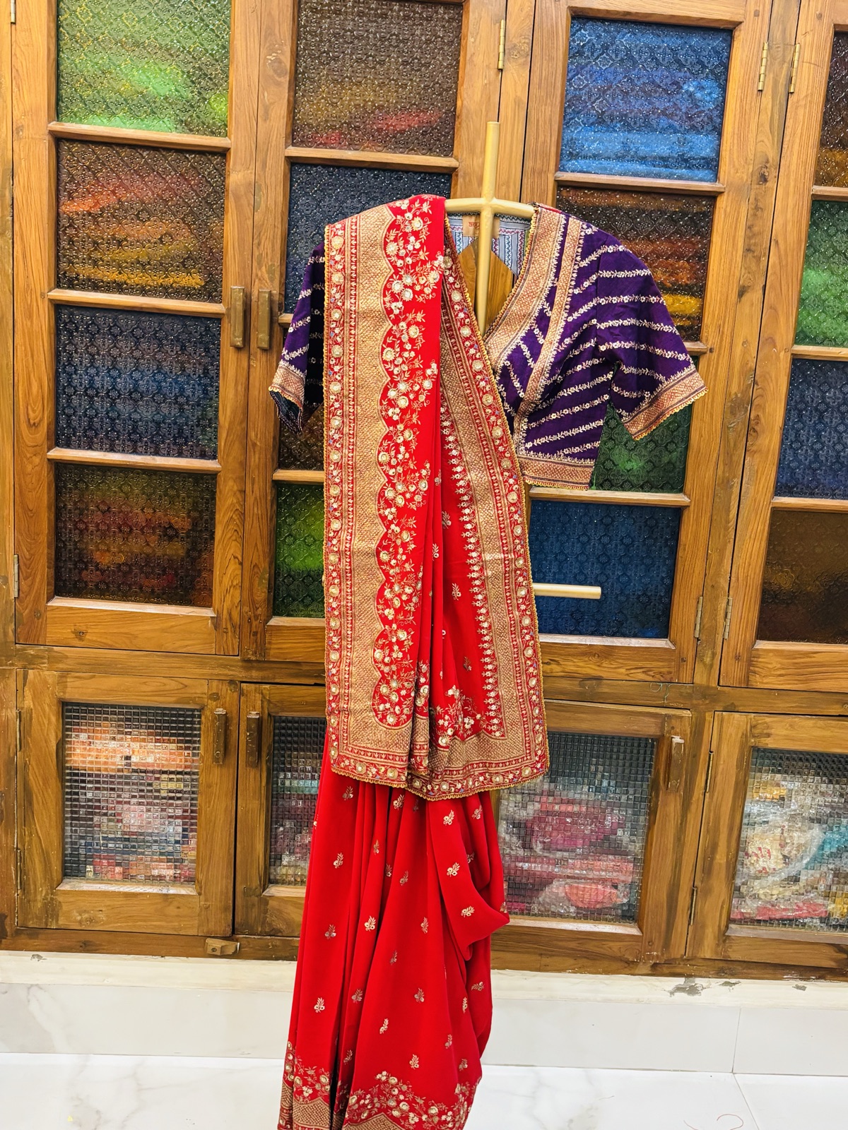Red Saree with Violet Bandhani Blouse