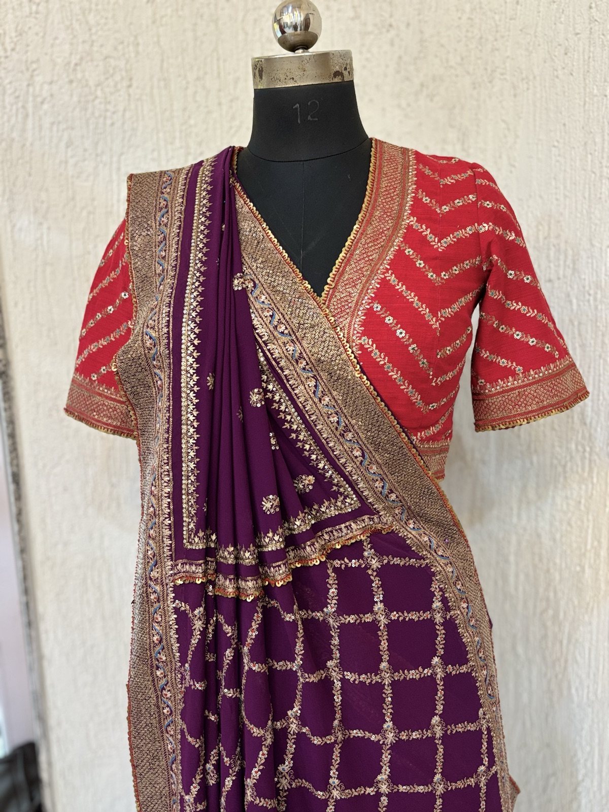 Wine Georgette Saree with Red Bandhani Blouse